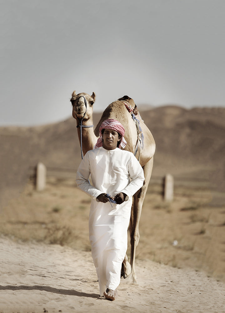Young man with his camel